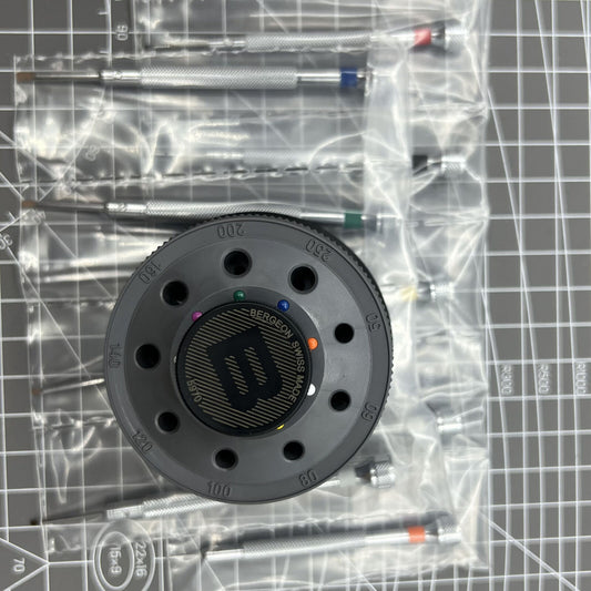Bergeon 5970 Swiss Made rotating tool with 9 precision screwdrivers for watch repairs.