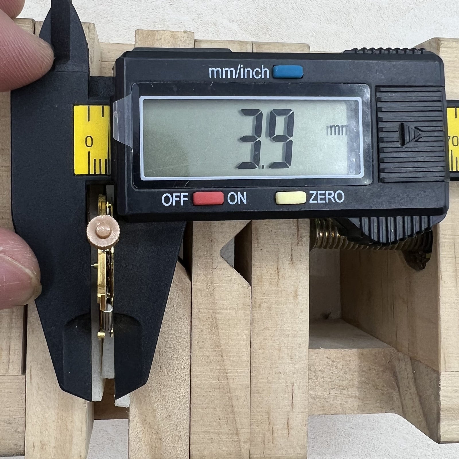 Swiss Ronda 6003.D quartz watch movement showing 3 hands and single calendar on black dial.