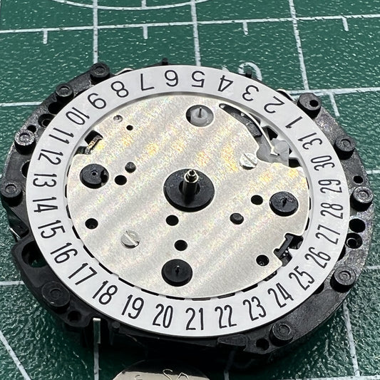 Hattori Epson VD53C quartz watch movement with date display at 6 o'clock, reliable timekeeping.