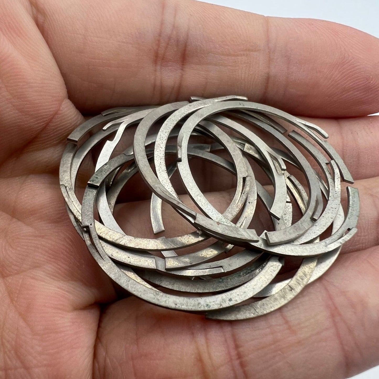 Steel spacer ring cushion mount for China Made 7120 watch movement, durable accessory.