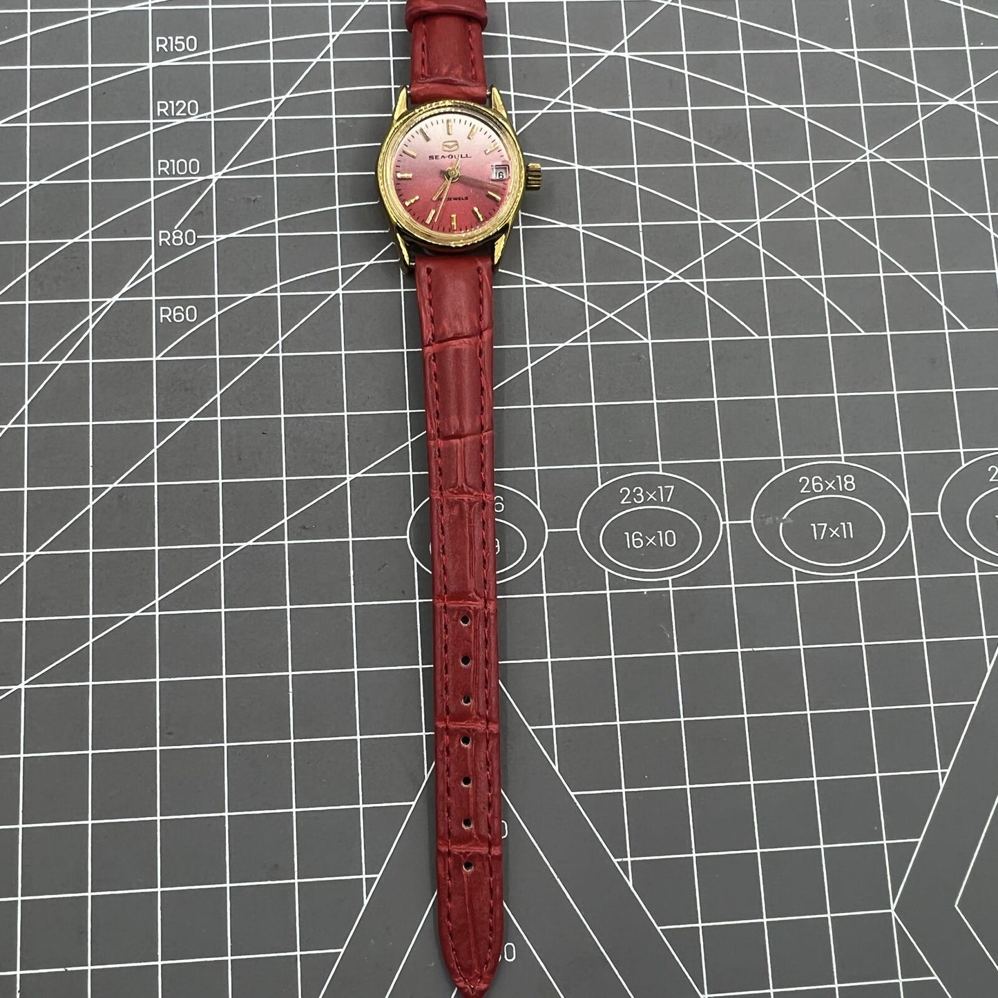 Montre mécanique manuelle Seagull pour femme, rouge, dégradé, clou doré, calendrier simple