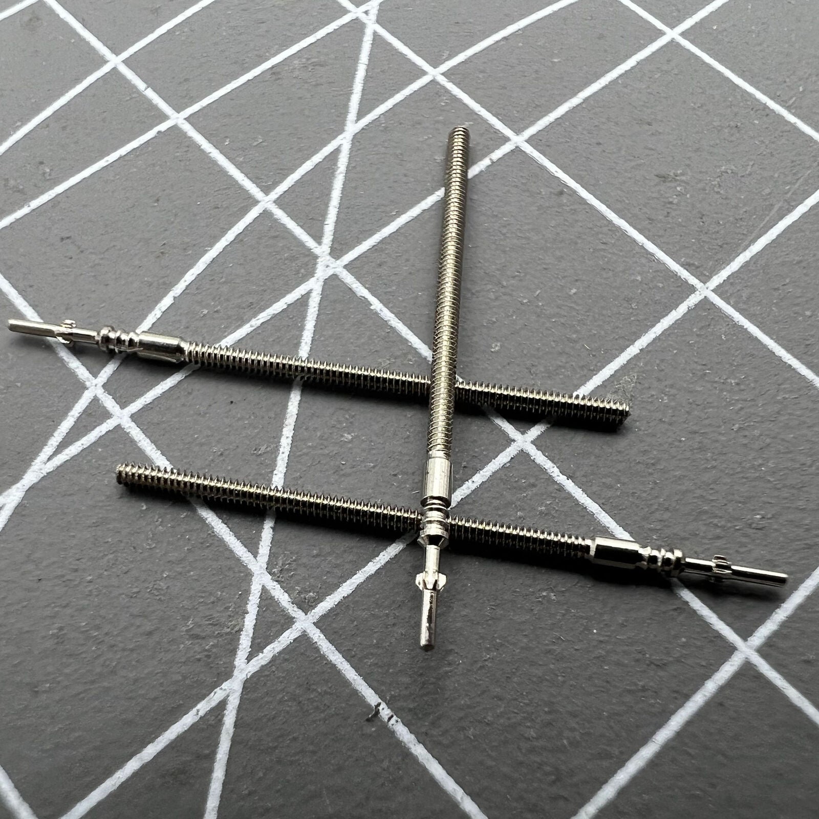 Replacement winding stems for ETA 802.002 movement watches, compatible with various watch models.