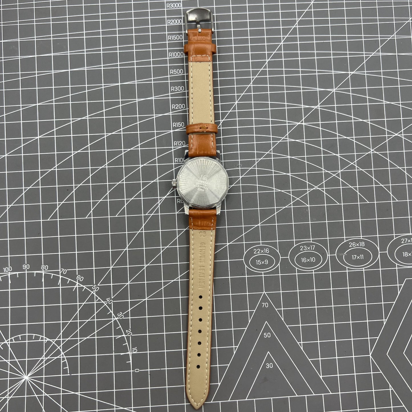 Silver 32mm Shanghai Factory manual mechanical watch with silver case and nail markers, elegant timepiece by Shanghai Factory