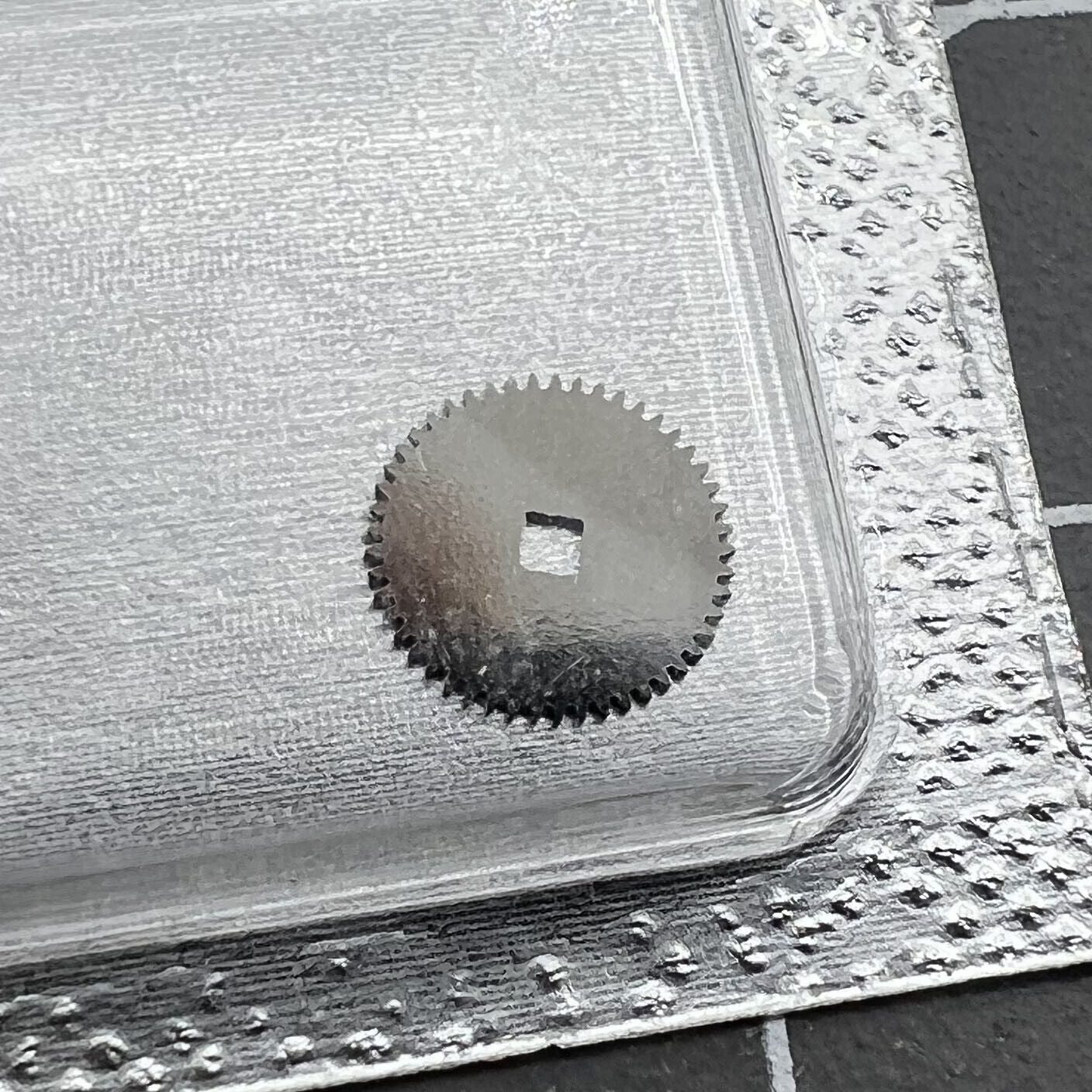 Ratchet wheel replacement for ETA 2892 watch movement, precision spare part for repair.