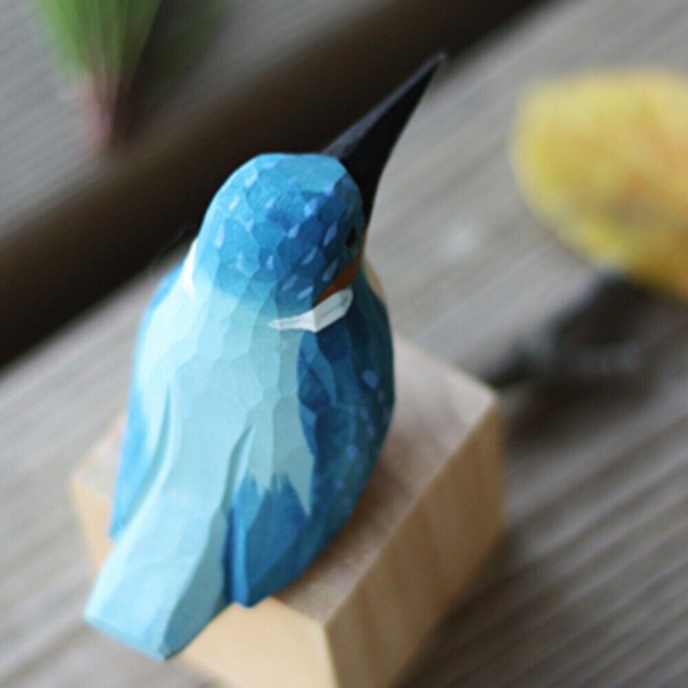 Handmade blue bird wooden figurine, decorative collectible artwork for home display.