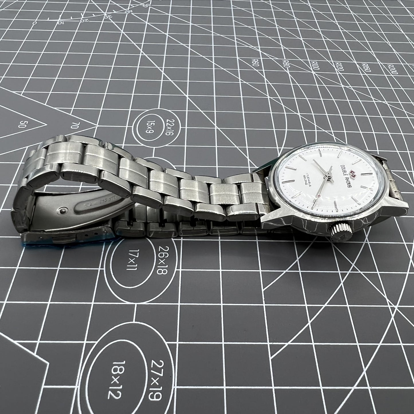 Beijing 31mm manual mechanical watch with silver case, three hands, classic China-made elegance.