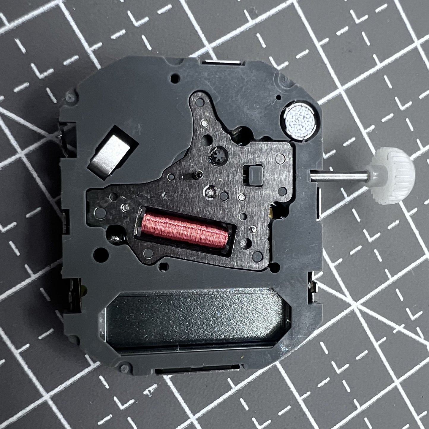 Japan Miyota T480 quartz movement watch mechanism with 3 hands and display screen for precise timekeeping.