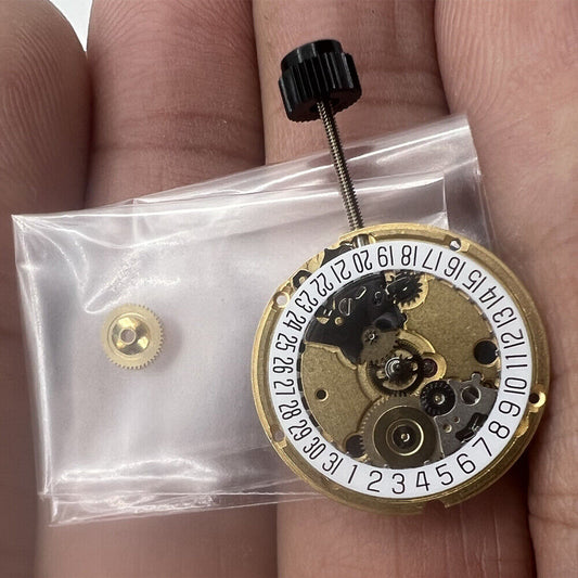 ETA 956.112 Swiss Made quartz watch movement with 3 hands and date at 6, precise timekeeping.