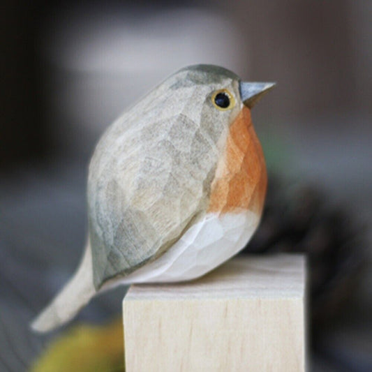 Handmade Redbreast wooden figurine, detailed decorative collectible sculpture.