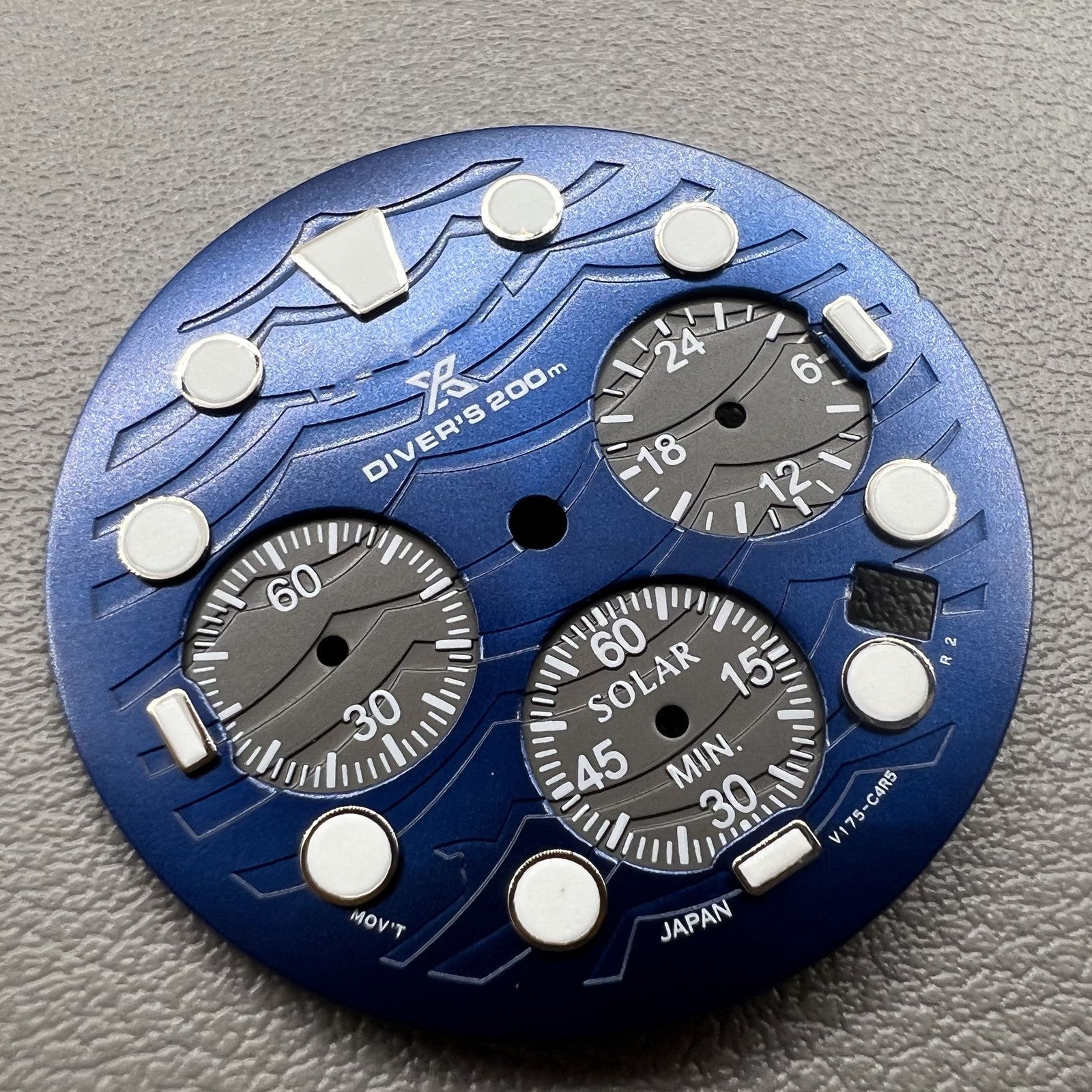 Green luminous watch dial with 31mm silver trim for VD53 movement, ideal for precise watch repairs.