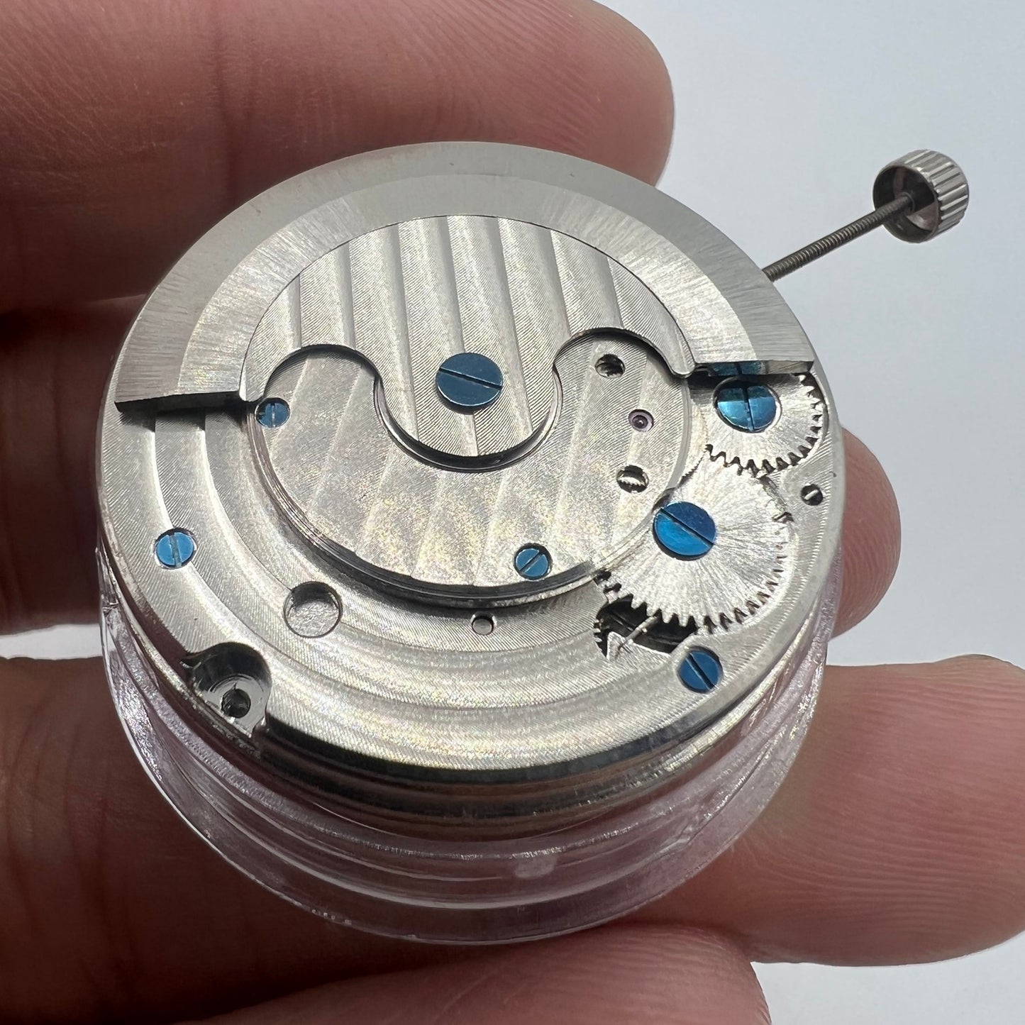 Multifunctional automatic watch featuring mechanical movement and kinetic energy tourbillon.