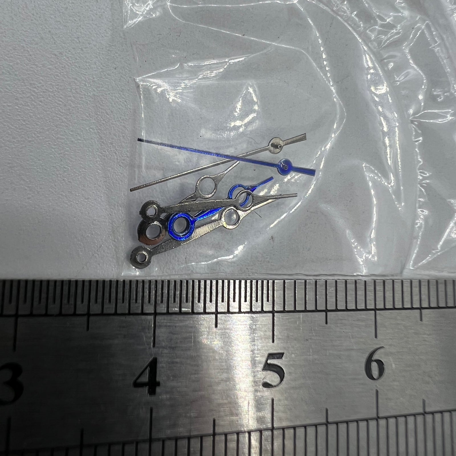 13mm blue hollow watch hands, no-lume design, compatible with Miyota 2035 quartz movement.