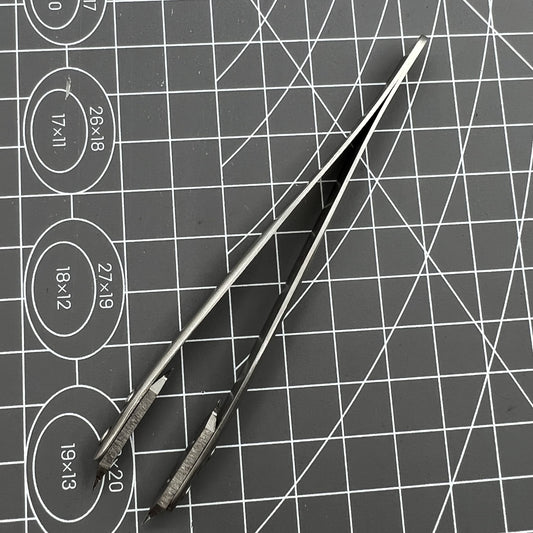 Precision Bergeon 7825 spring bar tweezer for watch lug removal and strap fitting tasks.