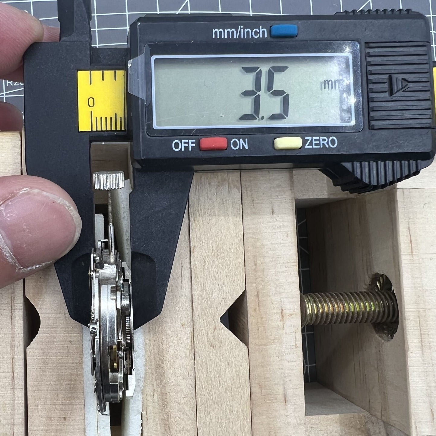 Tianjin Seagull ST25 automatic watch movement displaying three hands and large date, showcasing precise Chinese craftsmanship.