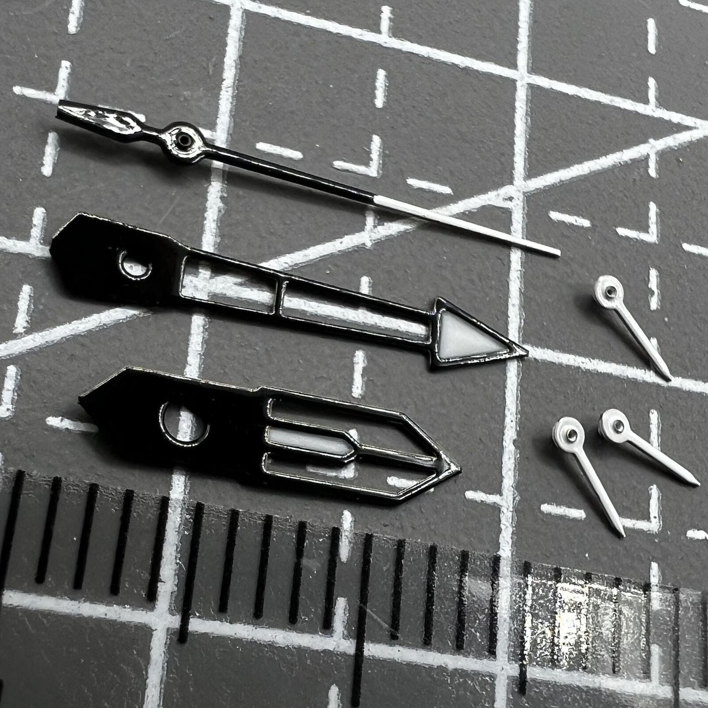 13mm white and black trim watch hands with green lume for PE90 movement, enhancing visibility and style.