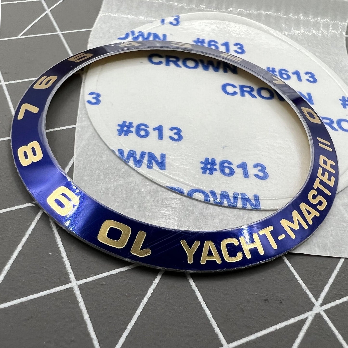 Golden silver aluminium alloy watch bezel insert with numerals for Yacht-Master 2, perfect for stylish upgrades.