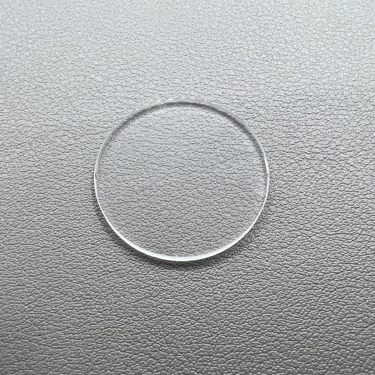 Set of 32 round 2.0mm thick watch glass crystals, 27.3-40.0mm, ideal for watch repair and replacement.