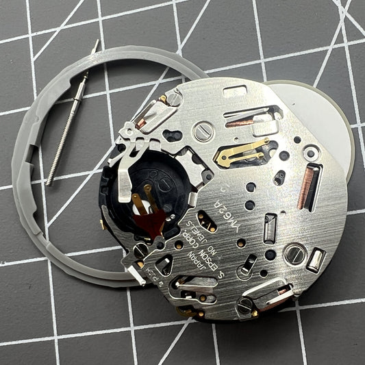 Hattori Epson TMI YM62A quartz watch movement by Japan Made, precise timekeeping component.