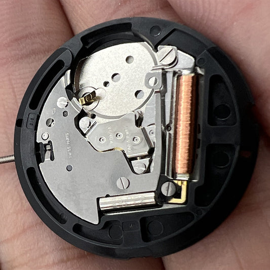 Ronda 515 quartz watch movement with date at 6, Swiss parts for precise timekeeping.