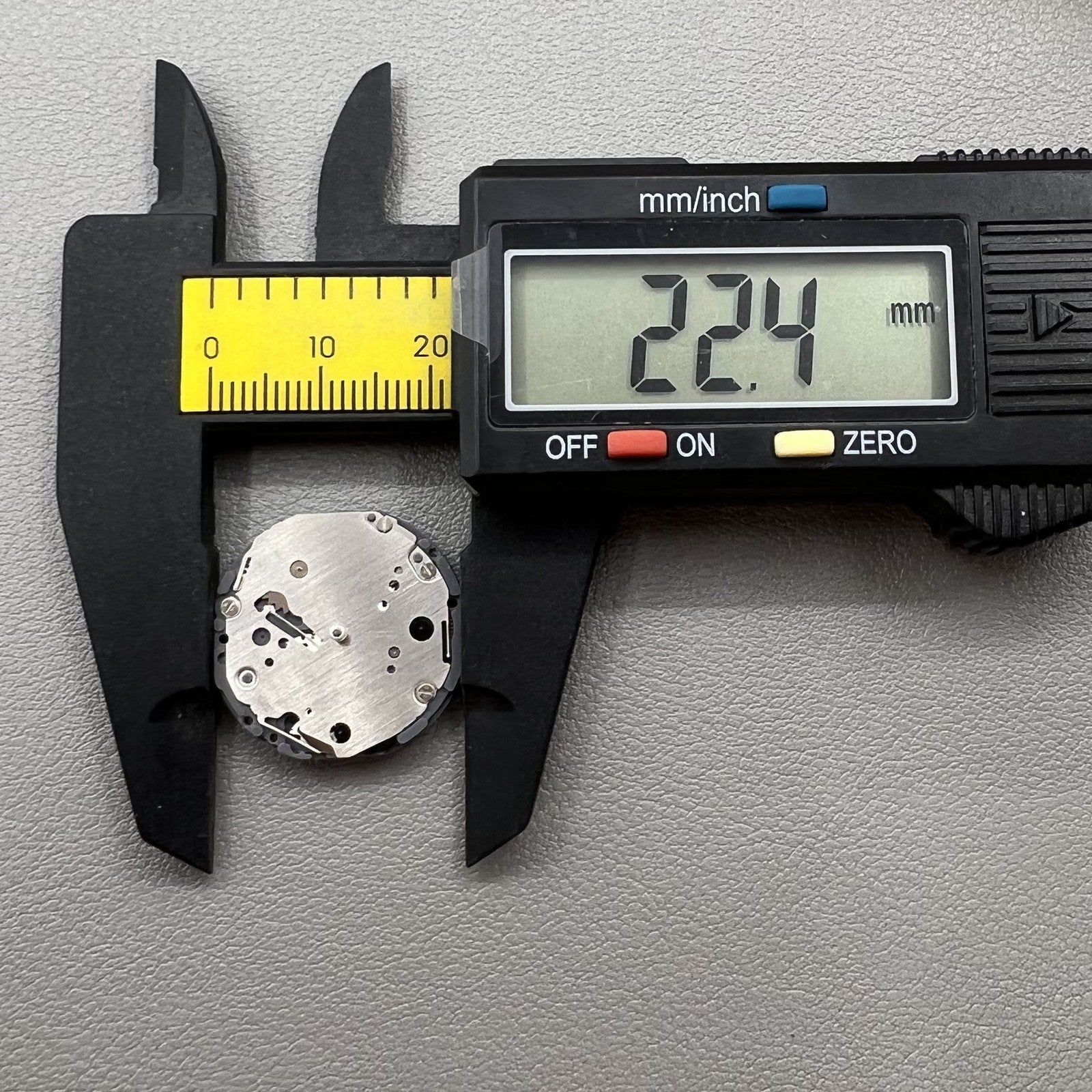 Japan Hattori Epson VD87A quartz watch movement showcasing precise timekeeping mechanism.