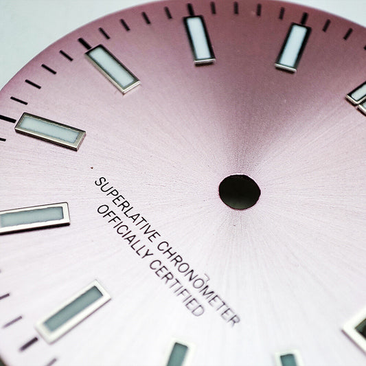 Green luminous metal polished pink watch dial designed for NH35 movement, ideal for custom watch builds.