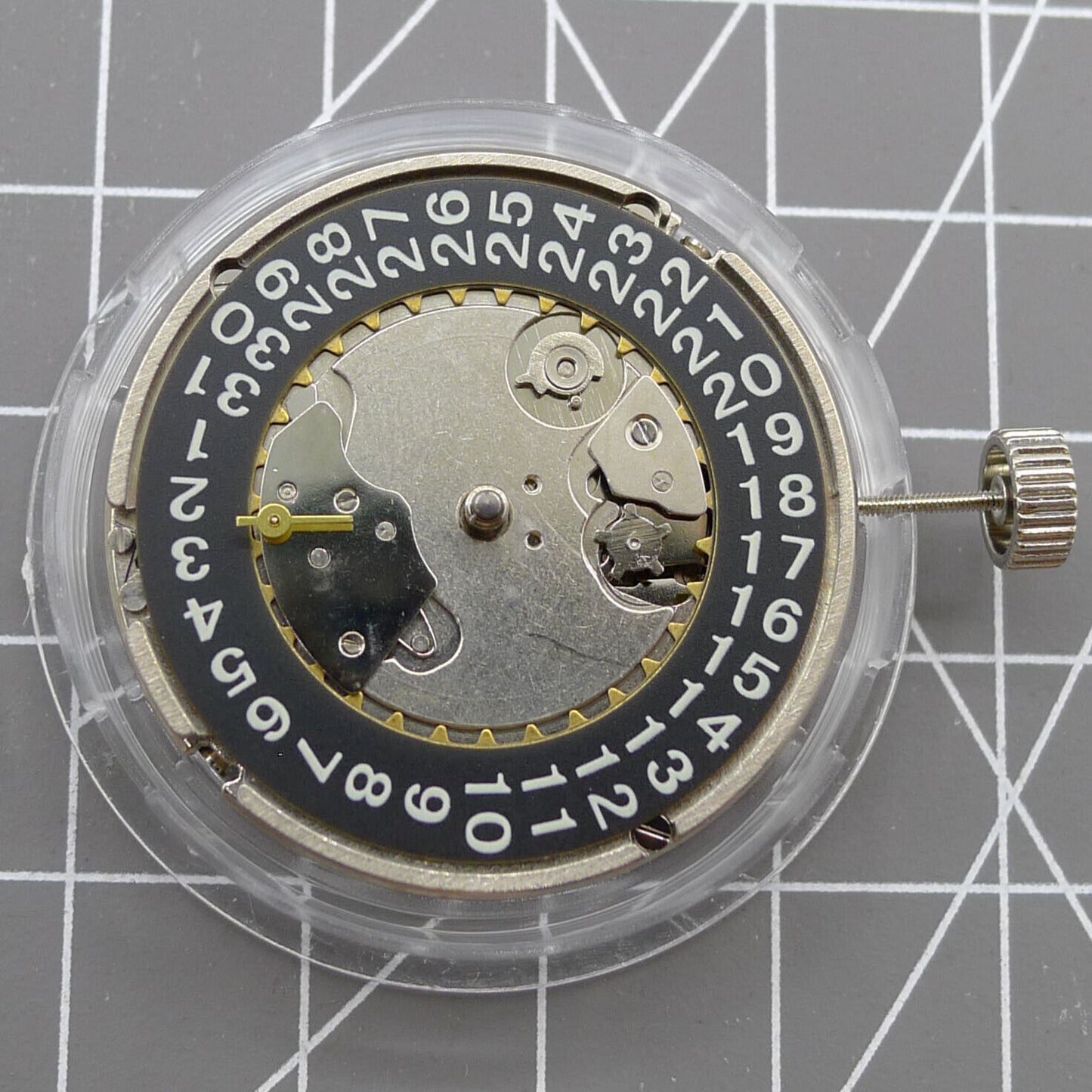 Black Seagull ST2555 automatic watch movement with second hand at 9H, perlage finish, and big date display.