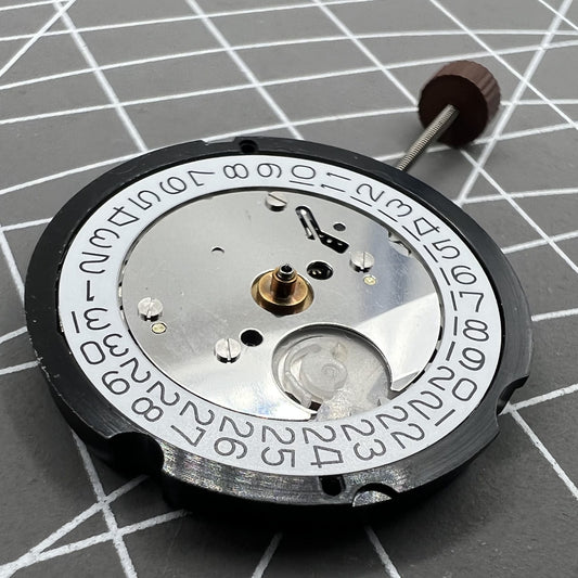 Swiss Ronda 505 quartz watch movement with date display at 3 o'clock for precision timekeeping.