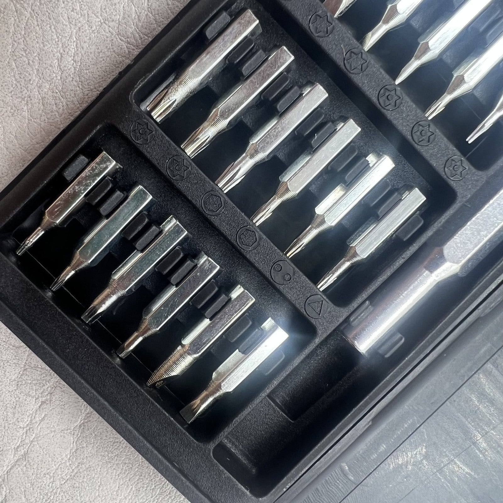 24-in-1 precision multi-tool set with magnetic alloy screwdrivers for detailed watch repairs.