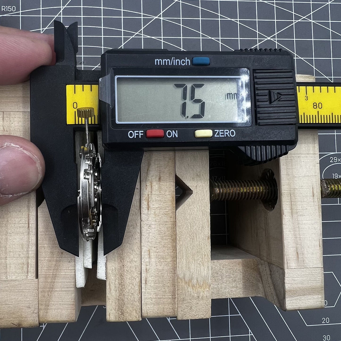 Dandong Silver Hollow watch accessory displaying automatic mechanical movement with second stop function for precision.