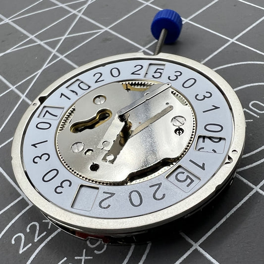 Swiss Ronda 5040B quartz watch movement with date function, precision timekeeping for watch accessories.