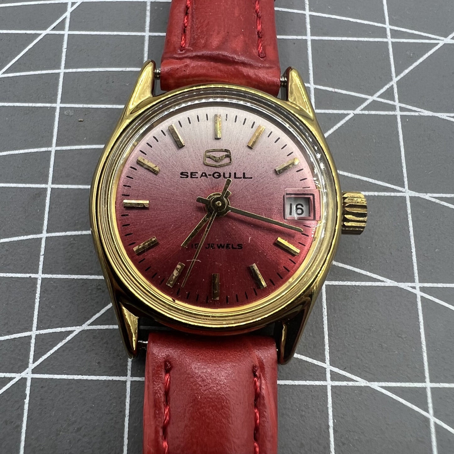 Montre mécanique manuelle Seagull pour femme, rouge, dégradé, clou doré, calendrier simple