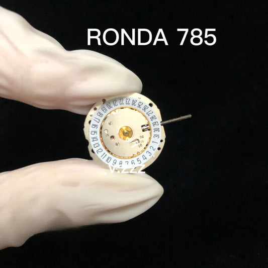 Original Swiss RONDA 785 calendar quartz movement in golden silver finish for precise watch accessories.