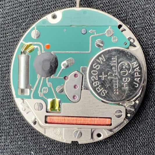 ETA 955.414 Swiss quartz watch movement with silver finish and single date calendar part.