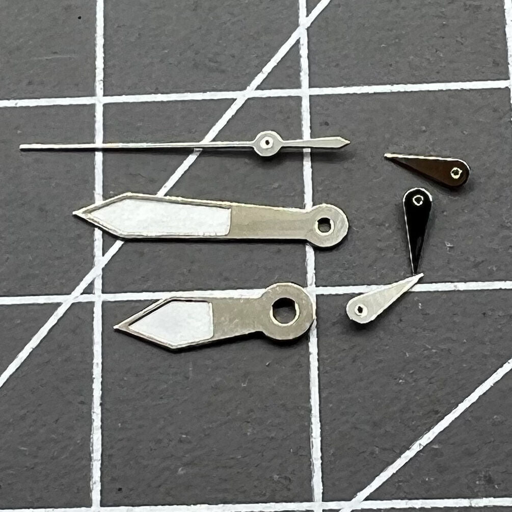 Aiguilles de montre luminescentes vertes 12 x 12 x 8 mm avec garniture argentée pour mouvement Epson VD53, VD54 et VD57