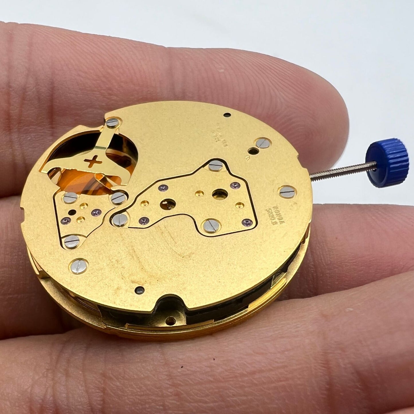 Swiss Made Ronda 5020B quartz movement for luxury watch repairs, ensuring precise timekeeping performance.