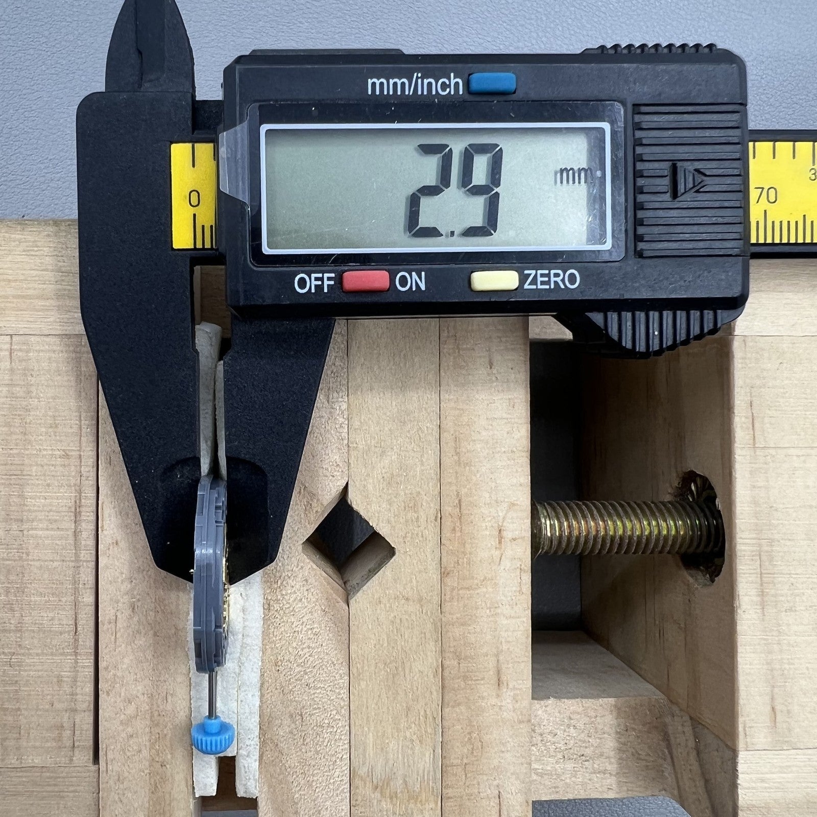 Japan Miyota Quartz watch movement 6M12 with date at 6 o'clock and three hands for precise timekeeping.