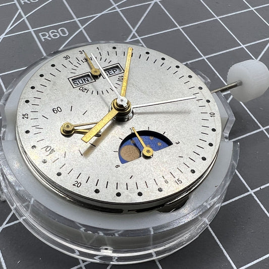 Close-up of Shanghai 7750 mechanical watch movement with moon phase at 6 o'clock, replacement for ETA 7751 7750.