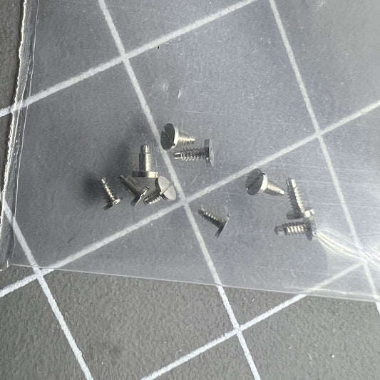 Close-up of Generic brand screws for Wheel Bridge Splint, compatible with China Made 7120 watch movement.