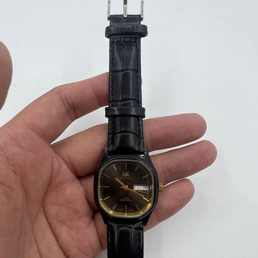 33mm Shanghai Factory manual mechanical watch with double calendar, black dial, classic design.