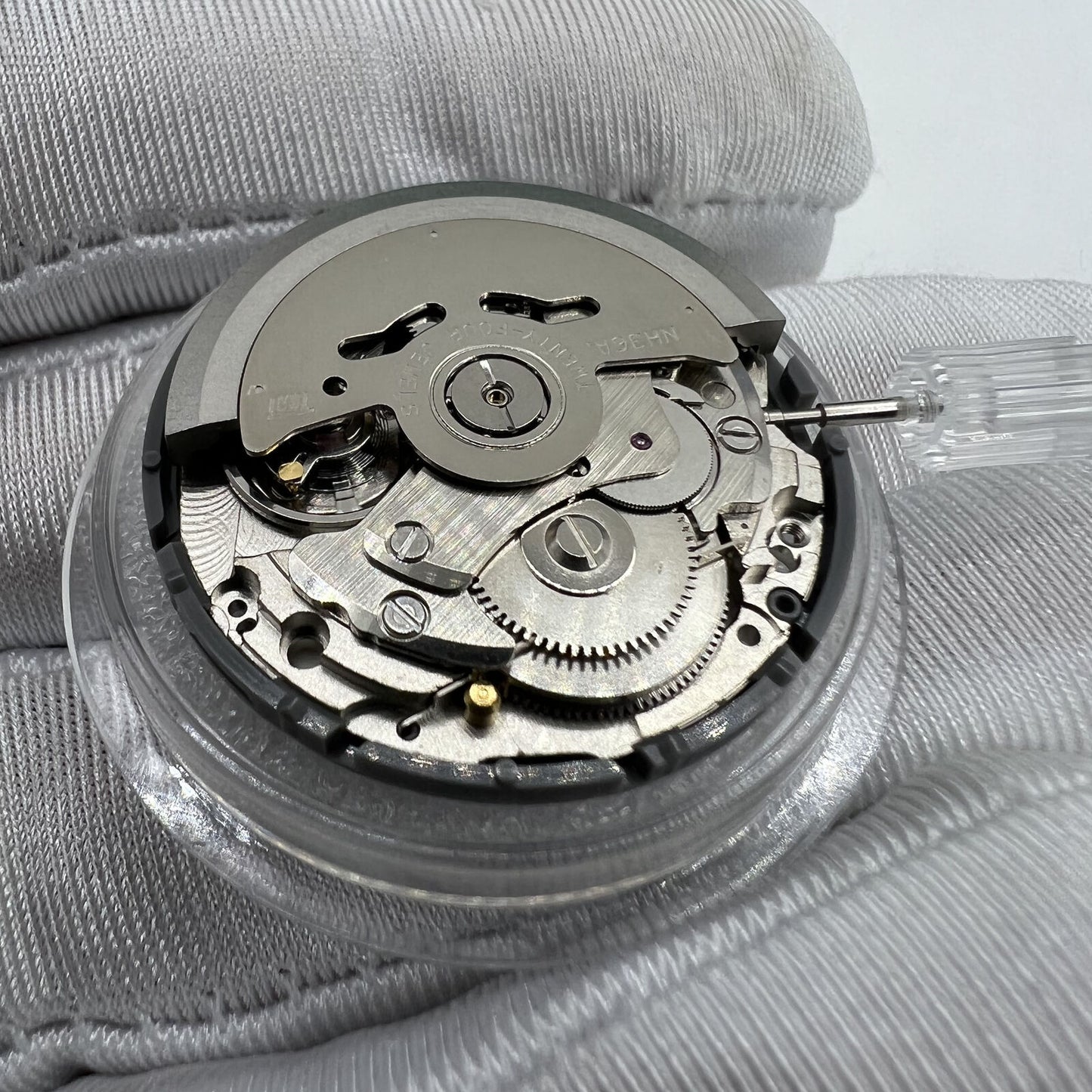 Japan Made NH36 automatic watch movement with Arabic date dial and 3 o'clock crown.