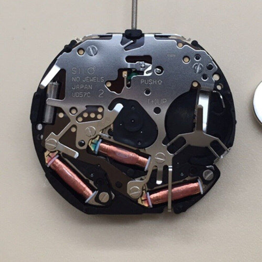 Epson VD57C watch movement with single date at 3, Japan-made precision for watch repairs.