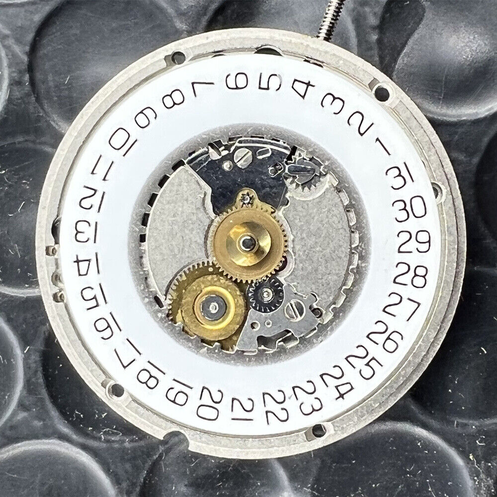 ETA 955.414 Swiss quartz watch movement with silver single calendar by ETA brand.