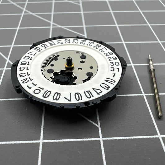 Japan-made Hattori Epson PC32 quartz watch movement with 3 hands and date display at 3 o'clock.