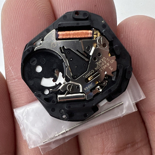 Hattori Epson VX3K quartz watch movement with date at 3/6, precision Japanese craftsmanship.