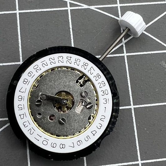 Ronda 585 Date At 3 quartz watch movement showing date window at 3 o'clock for accurate timekeeping.