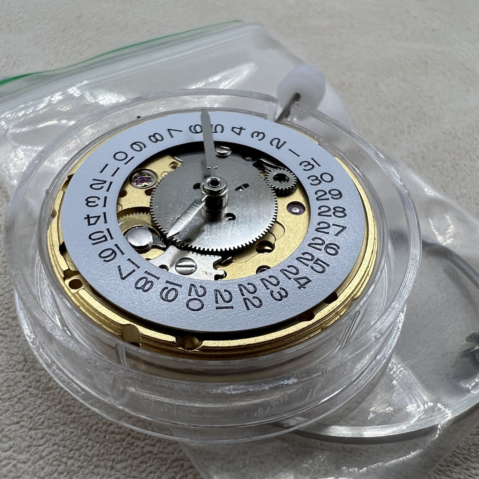 Hangzhou HZ6460 mechanical watch movement showing date window at 3 o'clock, ETA2836 alternative for accurate timekeeping