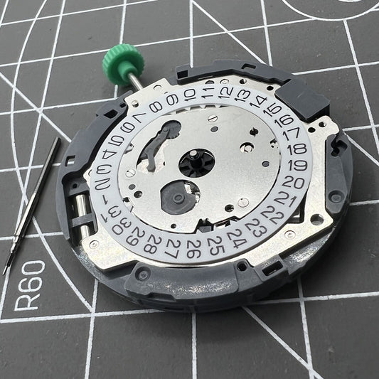 Miyota 0T45 quartz movement with date at 3, precision Japanese watch accessory parts.