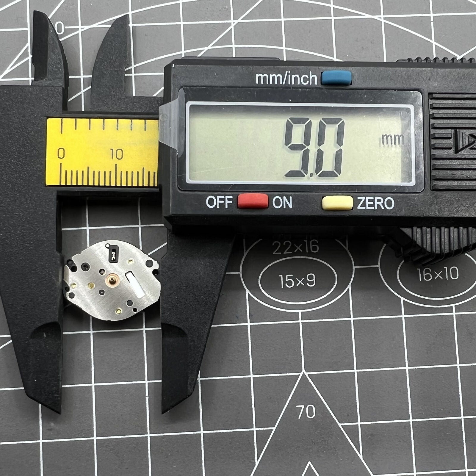 Hattori Epson AL21 Quartz watch movement showcasing precise timekeeping for watch repairs.