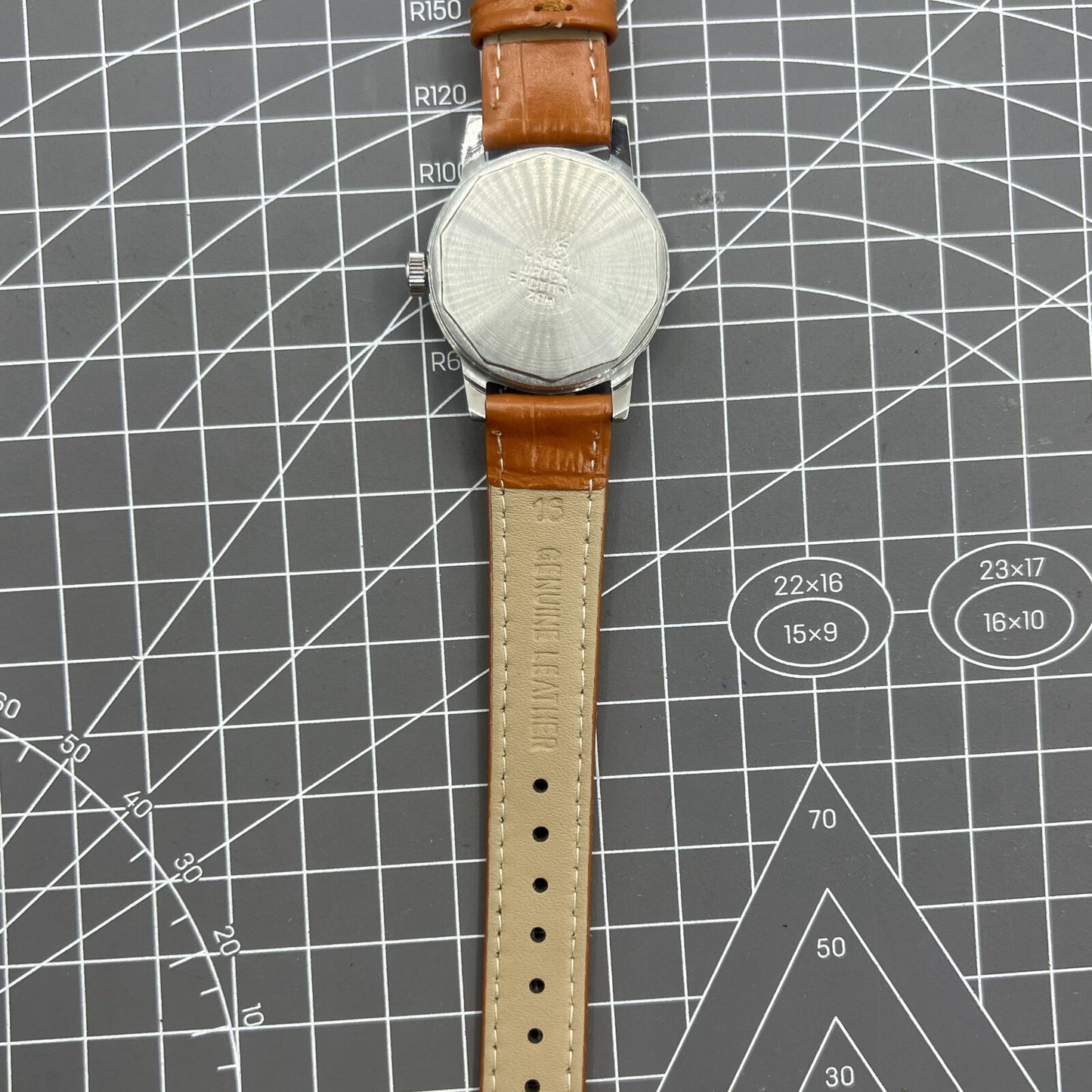 Shanghai Factory 32mm manual mechanical watch with silver case, silver hour markers, and classic design.