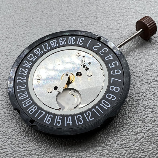 Swiss Black Disk Date watch with Ronda 515 quartz movement, 3 hands, sleek design.